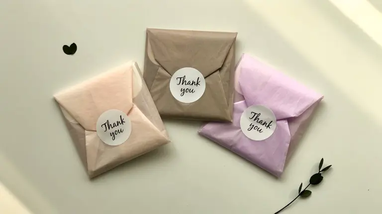 Beautiful gift-wrapping with colorful pastel tissue paper.